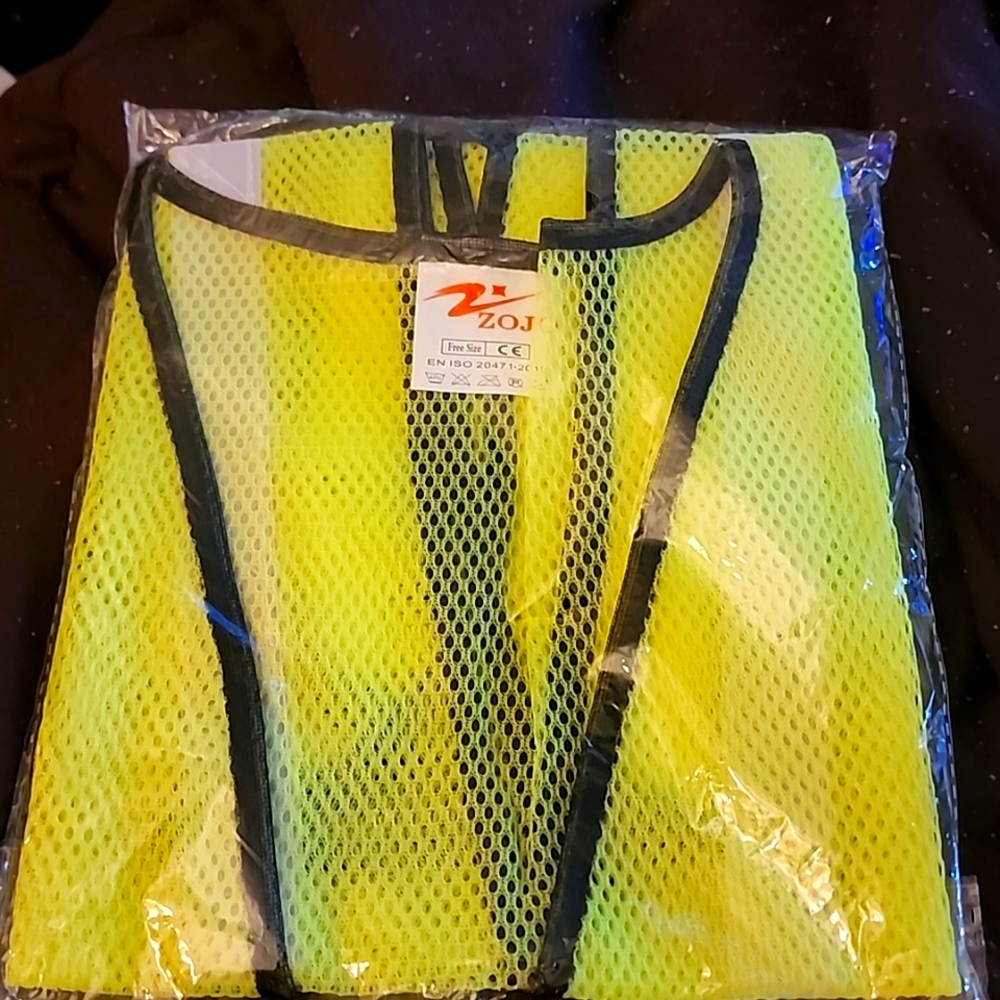 Two Construction worker vests size M  yellow and black
